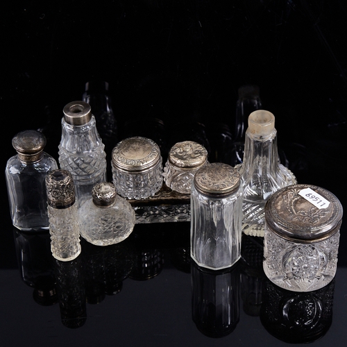 1283 - A group of 19th/20th century silver-topped glass dressing table jars, largest height 10.5cm (10)