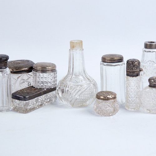 1283 - A group of 19th/20th century silver-topped glass dressing table jars, largest height 10.5cm (10)