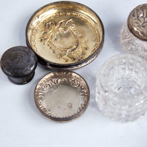 1283 - A group of 19th/20th century silver-topped glass dressing table jars, largest height 10.5cm (10)