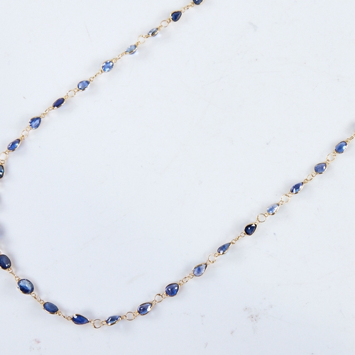 1287 - A modern handmade unmarked high carat gold sapphire line necklace, set with oval and pear-cut sapphi... 