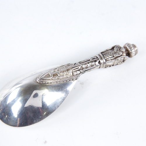 1292 - An early 20th century Danish silver presentation ladle, religious figure decorated handle with folia... 