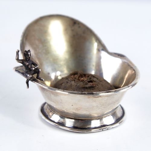 1293 - An early 20th century unmarked silver novelty pin cushion, modelled as a hip bath with a miniature s... 