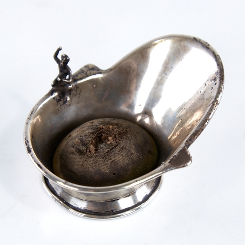 1293 - An early 20th century unmarked silver novelty pin cushion, modelled as a hip bath with a miniature s... 