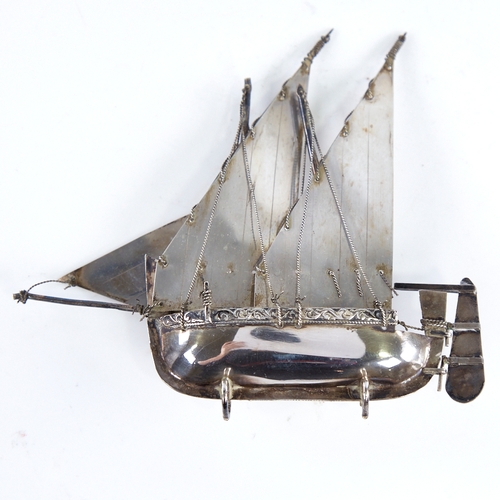 1299 - A modern Continental sterling silver miniature model ship, length 12.5cm, height 11cm