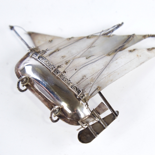 1299 - A modern Continental sterling silver miniature model ship, length 12.5cm, height 11cm