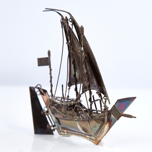 1300 - A modern Continental sterling silver miniature model ship, length 12.5cm, height 12cm