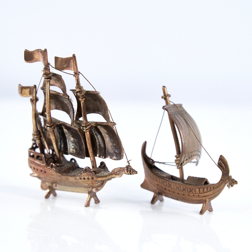 1301 - 2 modern Continental silver-gilt miniature model ships, largest height 7cm (2)