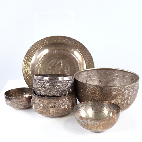 1313 - A group of various Eastern unmarked white metal bowls and trays, largest diameter 14cm, 9.4oz total ... 