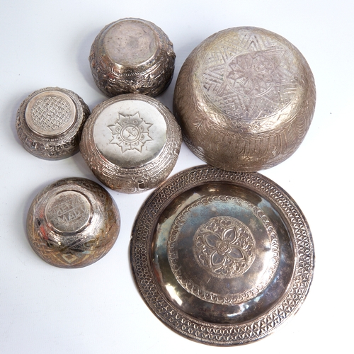 1313 - A group of various Eastern unmarked white metal bowls and trays, largest diameter 14cm, 9.4oz total ... 