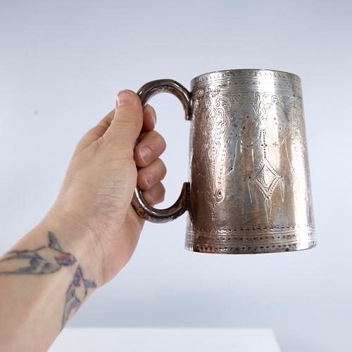 1314 - A Victorian silver pint tankard/mug, tapered cylindrical form with C-shaped handle, with engraved Ad... 