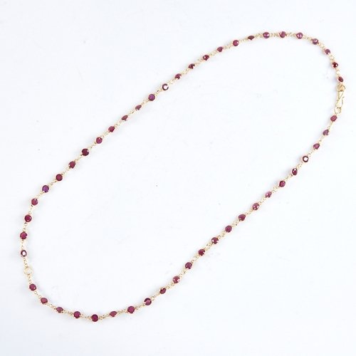 1316 - A modern handmade unmarked high carat gold ruby line necklace, set with round-cut rubies, necklace l... 