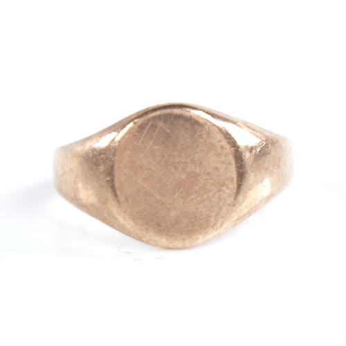 1317 - A late 20th century 9ct gold signet ring, setting height 10.6mm, size I, 4g