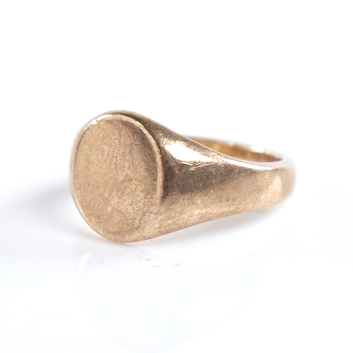 1317 - A late 20th century 9ct gold signet ring, setting height 10.6mm, size I, 4g