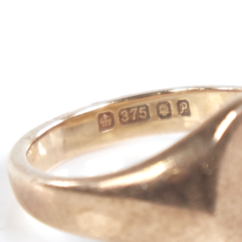 1317 - A late 20th century 9ct gold signet ring, setting height 10.6mm, size I, 4g