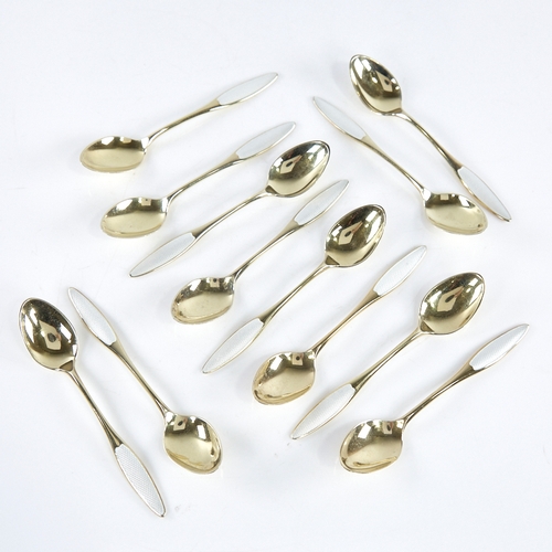 1322 - FRIGAST - a set of 12 Vintage Danish vermeil sterling silver and white enamel coffee spoons, spoon l... 