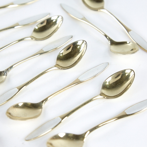 1322 - FRIGAST - a set of 12 Vintage Danish vermeil sterling silver and white enamel coffee spoons, spoon l... 