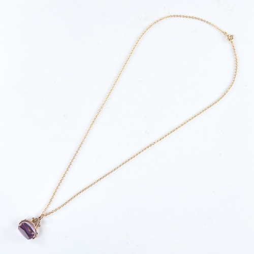 1326 - A late 20th century 9ct gold amethyst swivel fob pendant necklace, on unmarked gilt metal chain, pen... 