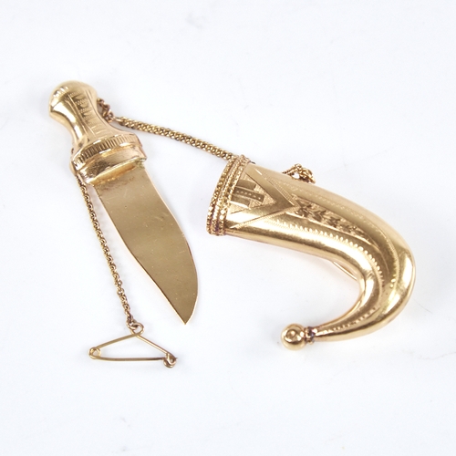 1328 - A Persian unmarked gold Jambiya dagger brooch, opening to reveal blade, engraved decoration, brooch ... 