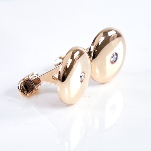 1330 - A modern pair of 18ct rose gold diamond bombe panel cufflinks, total diamond content approx 0.2ct, p... 