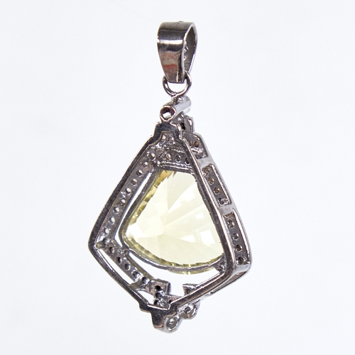 1331 - A modern unmarked silver citrine diamond and ruby pendant, set with 15ct fantasy-cut citrine rose-cu... 