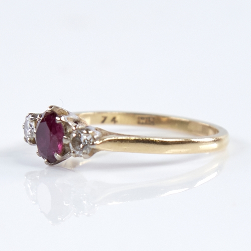 1338 - A mid-20th century 18ct gold 3-stone ruby and diamond ring, set with oval-cut ruby and round brillia... 