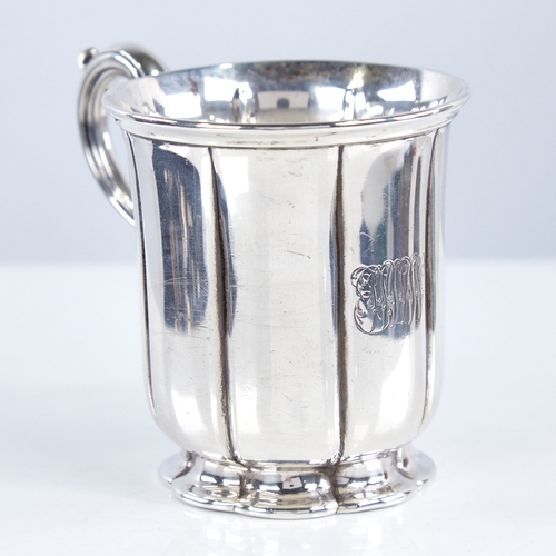 1350 - A Victorian silver christening mug, cylindrical pumpkin form with scrolled acanthus leaf handle, by ... 