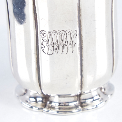 1350 - A Victorian silver christening mug, cylindrical pumpkin form with scrolled acanthus leaf handle, by ... 