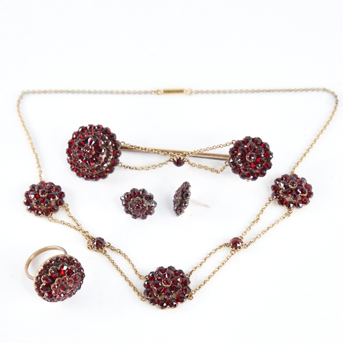 1356 - A Victorian Bohemian faceted garnet demi-parure, comprising necklace, bar brooch, ring and pair of s... 