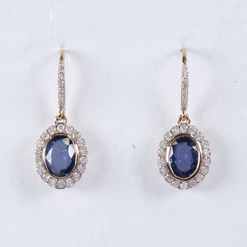 1358 - A modern pair of 14ct gold sapphire and diamond cluster drop earrings, central oval-cut sapphires su... 