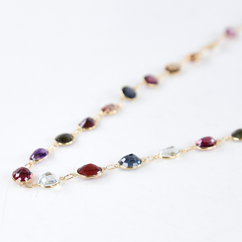 1360 - A modern handmade 14ct gold graduated gem set line necklace, gemstones include amethyst citrine smok... 