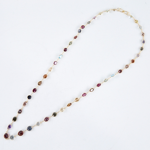 1360 - A modern handmade 14ct gold graduated gem set line necklace, gemstones include amethyst citrine smok... 