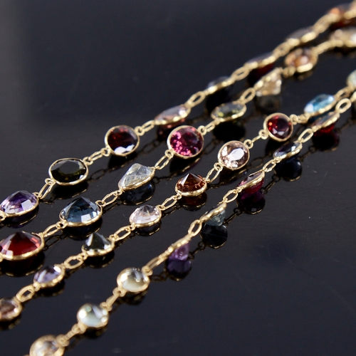 1360 - A modern handmade 14ct gold graduated gem set line necklace, gemstones include amethyst citrine smok... 