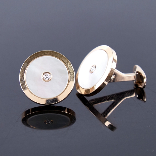 1362 - A modern pair of 18ct gold mother-of-pearl and diamond target panel cufflinks, total diamond content... 