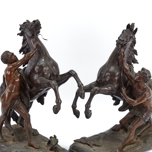 311 - A pair of 19th century bronze patinated spelter Marley Horse ornaments, height 32cm, and a spelter r... 