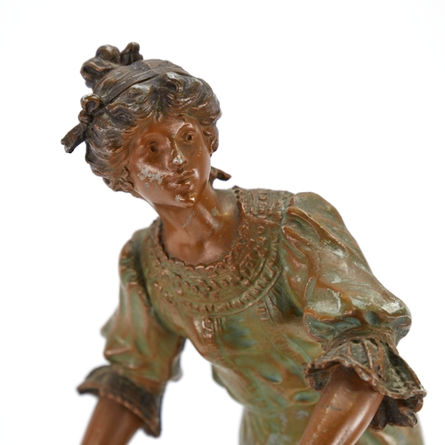 312 - A French coloured marble-cased mantel clock, circa 1910, surmounted by a figure of a lady tennis pla... 