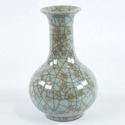 348 - A Chinese celadon crackle glaze porcelain vase, seal mark under base, height 18cm