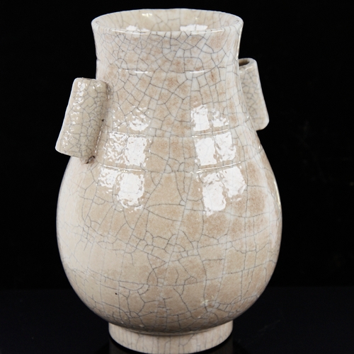 353 - A Chinese crackle glaze porcelain 2-handled vase, height 20cm, rim diameter 9cm