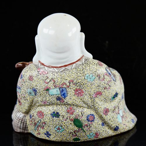 355 - A Chinese porcelain seated Buddha, height 16cm