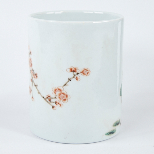 357 - A Chinese white glaze porcelain brush pot, with painted bird and blossom tree, height 12cm, diameter... 