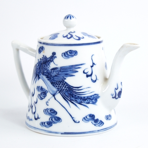 360 - A Chinese blue and white porcelain teapot, with painted dragon design, 6 character mark, height 12cm