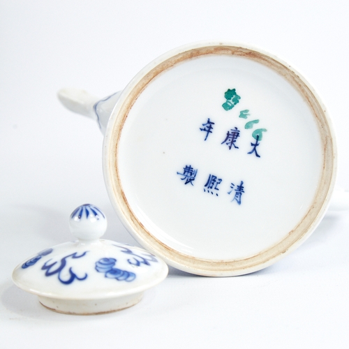 360 - A Chinese blue and white porcelain teapot, with painted dragon design, 6 character mark, height 12cm