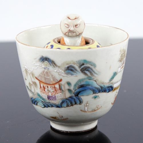 363 - A Chinese porcelain bowl with central rising figure, diameter 7.5cm