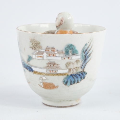 363 - A Chinese porcelain bowl with central rising figure, diameter 7.5cm