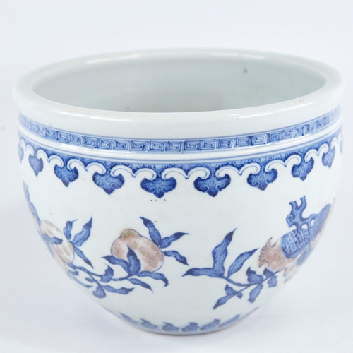 365 - A Chinese blue and white porcelain jardiniere, with hand painted fruit decoration, diameter 24cm, he... 