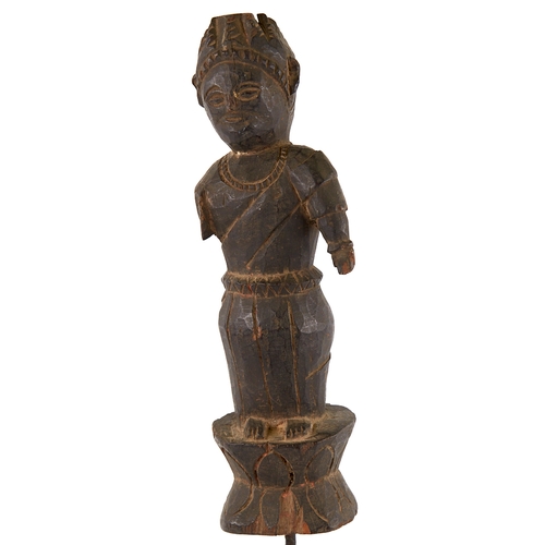 389 - An Indian carved and stained wood figure on metal stand, overall height 47cm