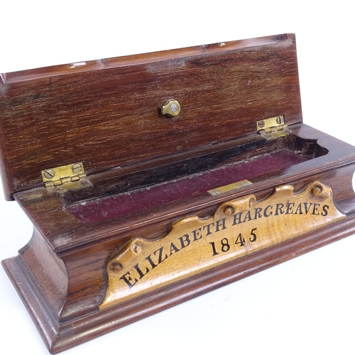 242 - A mid-19th century mahogany sarcophagus-shaped pen box, with shaped and scrolled hinged lid and sati... 