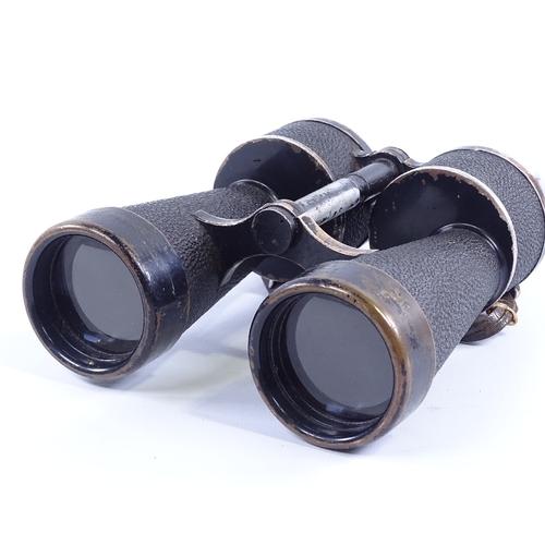 247 - A pair of German Second World War Period military binoculars, 7x50, with military crest