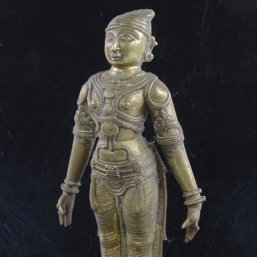 250 - An Indian bronze figure of God, probably 17th or 18th century, wearing detailed dress, height 23cm