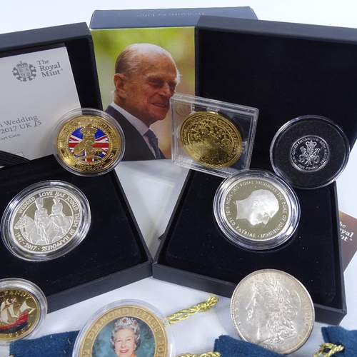 259 - A group of commemorative coins, including Britannia 2017 UK 6 coin silver proof set, 2017 Platinum W... 