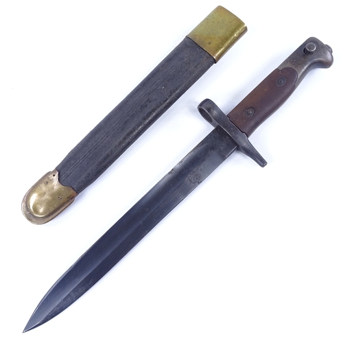 286 - An Italian First World War Period bayonet, 1870/15 pattern with brass-mounted leather scabbard, blad... 